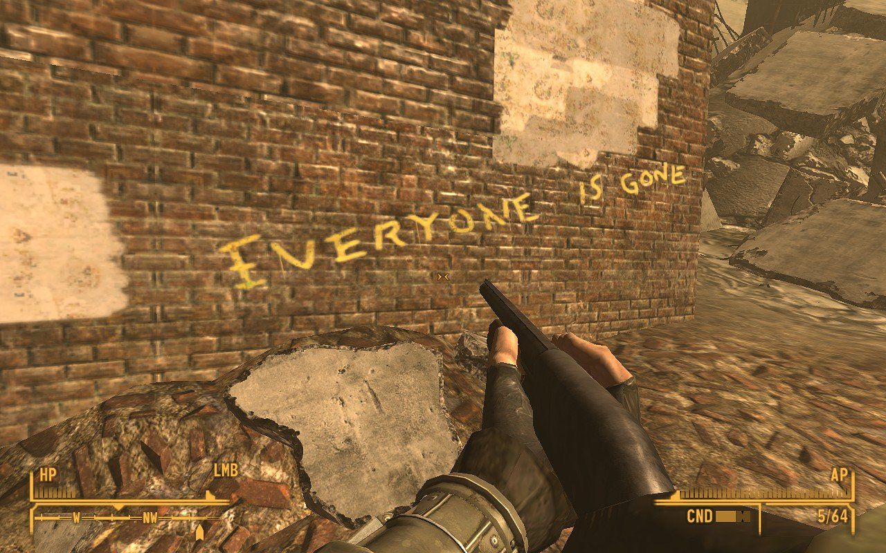 The text “Everyone is Gone” written on a brick wall