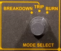 mode selector switch of a high voltage tester, labled breakdown, trip, burn